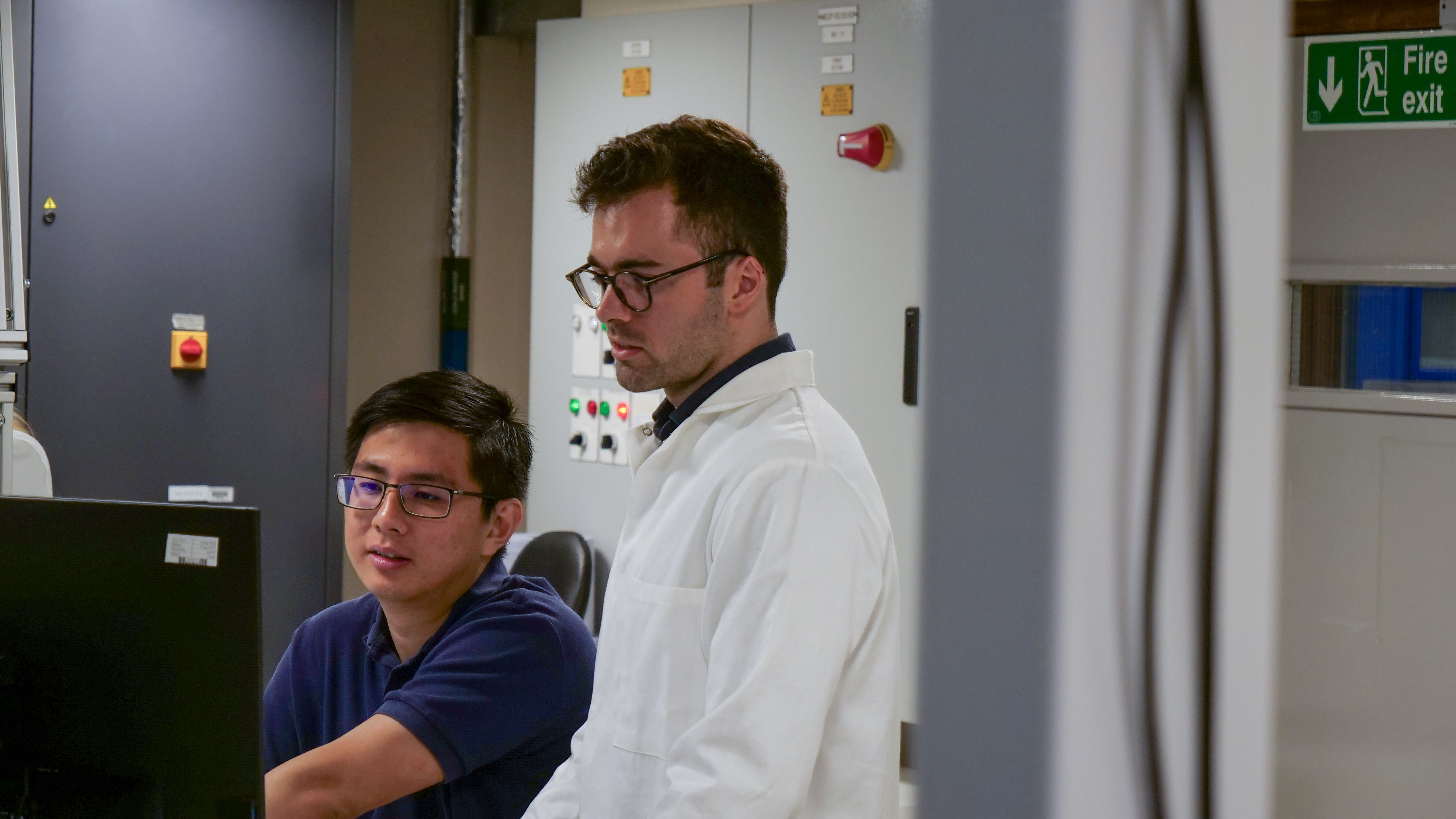 Two engineers in a laboratory