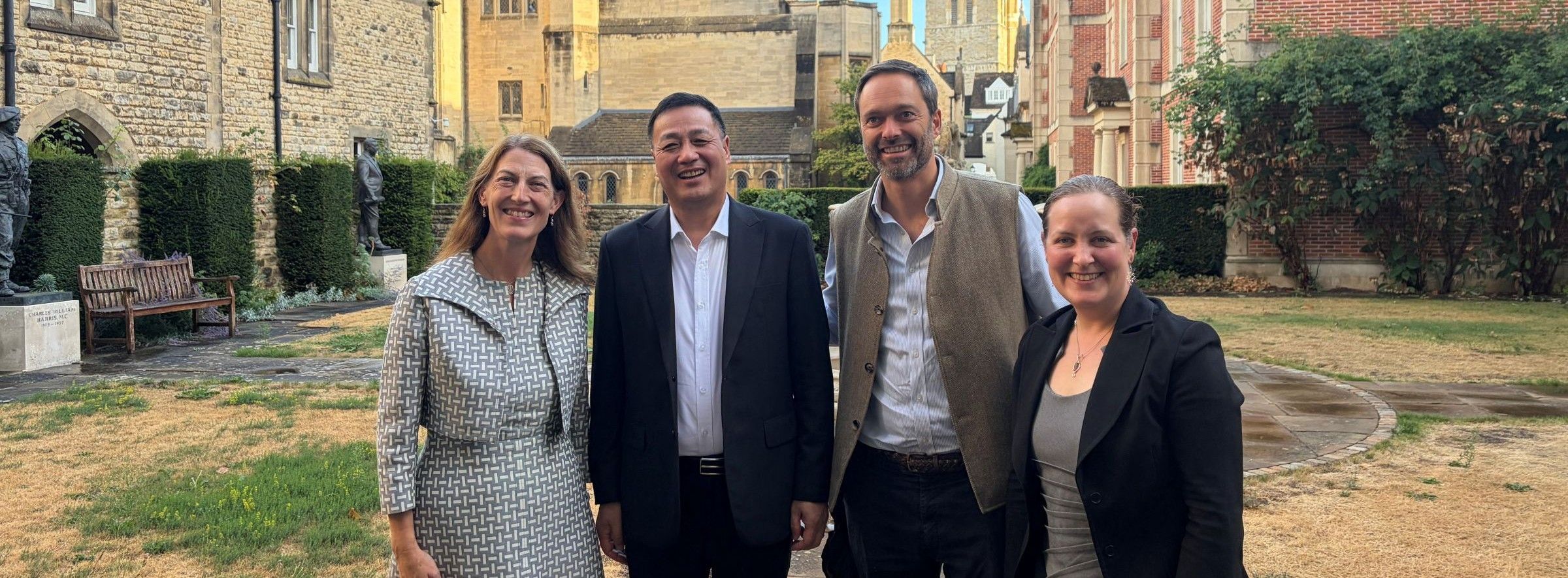 Wilson Sea, Beth Breeze, Jan-Emmanuel De Neve and Bethany Sollereder in the College grounds