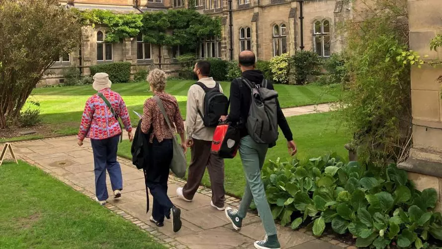 People walking through the College grounds