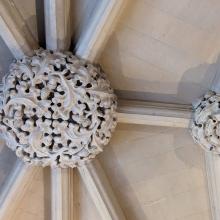 Two decorated ceiling bosses, one based on oak leaves and acorns and the other with the Lancaster rose.