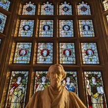 A picture of the Warrington Windows with the martineau statue in the foreground